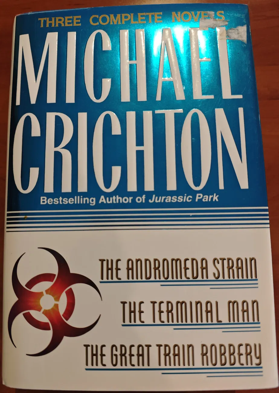 Three Complete Novels by Michael Crichton book cover